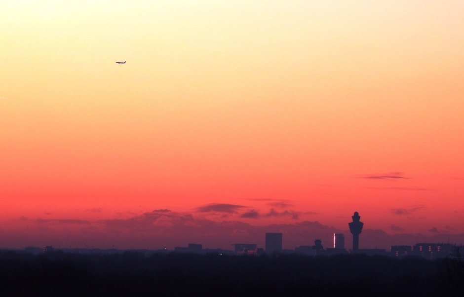 zonsondergang richting Schiphol airport