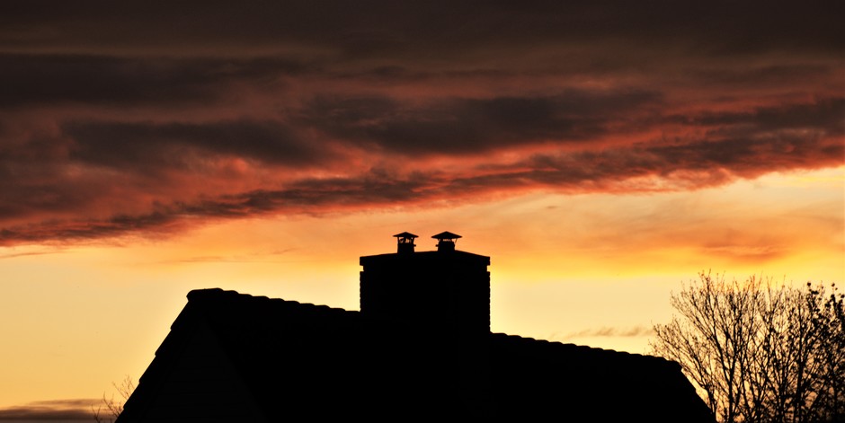 Zonsondergang #BlijftThuis vanuit het dakraam