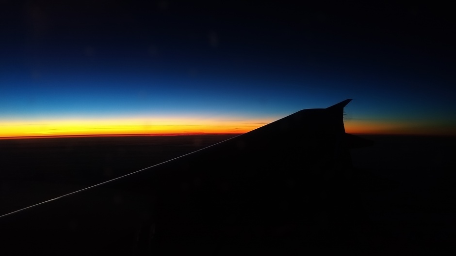 Zonsondergang vanuit het vliegtuig
