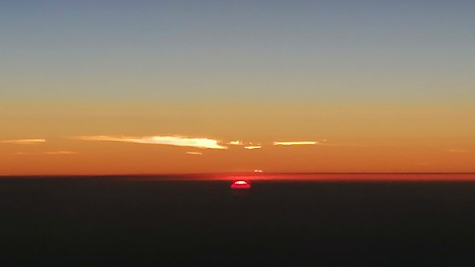 Zonsondergang gisteravond vanuit vliegtuig 