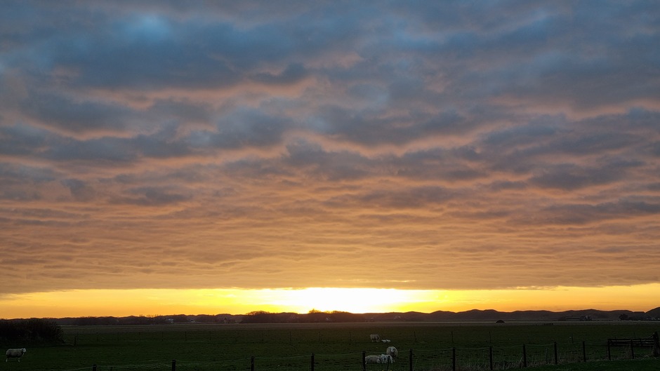 Zonsondergang boven Texel